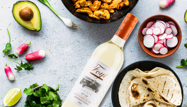 Bottle of Foyt Sauvignon Blanc and taco components